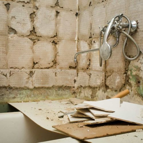 old bathroom without renovation. chipped tile. preparation for home renovation